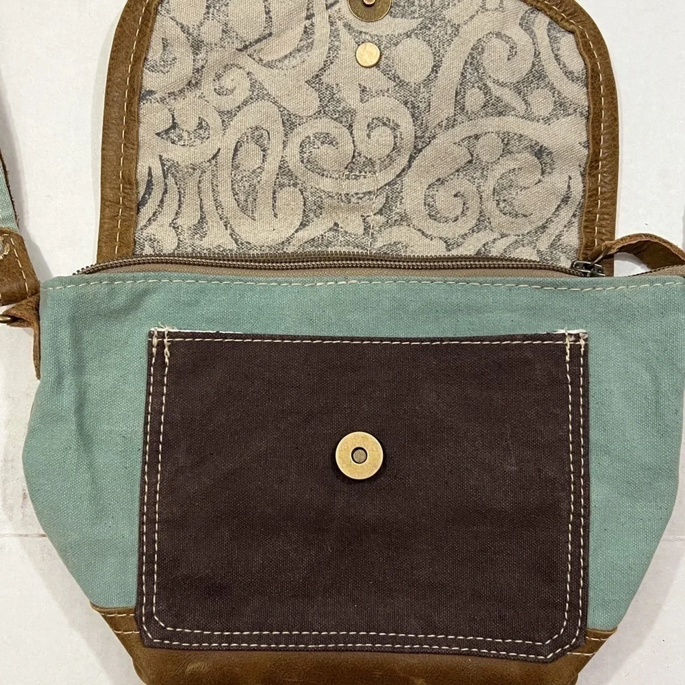 Myra bag Paisley swirl print small cross body bag canvas leather.